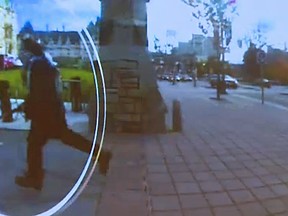 Michael Zehaf-Bibeau is pictured in this RCMP security video footage. Zehaf-Bibeau was in Ottawa to try to get a passport to travel to Syria prior to his attack on Parliament, the agency said Thursday, but he was not on the agency's watchlist. (RCMP handout)
