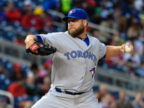 Toronto Blue Jays pitcher Mark Buehrle (56) throws during the second inning against the Washington Nationals Wednesday at Nationals Park. (Tommy Gilligan/USA TODAY Sports)