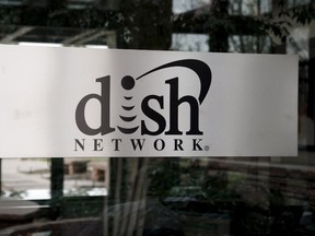 The sign in the lobby of the corporate headquarters of Dish Network is seen in the Denver suburb of Englewood, Colorado in this April 6, 2011 file photo. (REUTERS/Rick Wilking/Files)