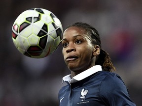 France's midfielder Elodie Thomis eyes the ball during the friendly football match France vs Russia on May 22, 2015 at the Gaston Petit stadium in Chateauroux.  AFP PHOTO / FRANCK FIFE