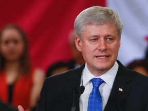 Canada's Prime Minister, Stephen Harper, along with Minister of Finance, Joe Oliver and Cindy Barkway, who lost her husband during 911, were at the Yorkdale Holiday Inn in Toronto, Ont. to announce, a number of steps being made to increase the security and safety for Canadians on Thursday June 4, 2015. (Dave Thomas/Postmedia Network)