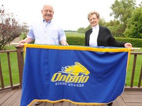 Langton's Merlin and Denise Howse hold the Ontario Sires Stakes blanket won by their horse 'Sportskeeper' on May 29, 2015. The three-year-old won the $70,000 Gold Series event and set the Western Fair Raceway track record in the process. JACOB ROBINSON/Simcoe Reformer