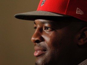 Tampa Bay Buccaneers quarterback Jameis Winston (3) is introduced at a press conference the day after being selected as the No. 1 overall pick in the 2015 NFL Draft. (Kim Klement/USA TODAY Sports)