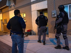 Dozens of people were arrested in pre-dawn raids in Toronto and elsewhere in Southern Ontario Thursday as part of Project Pharaoh, an investigation targeting a mid-level street gang known as Monstarz. (Photo courtesy Toronto Police)