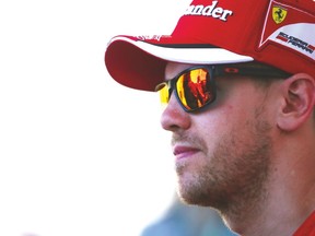 Ferrari’s Sebastian Vettel looks on during previews to the Canadian Formula 1 Grand Prix at Circuit Gilles Villeneuve yesterday in Montreal. (AFP)