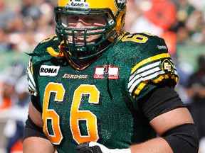 Greg Wojt, shown here in his first stint with the Eskimos in 2012, left practice early Thursday with a grim look on his face. (Edmonton Sun)