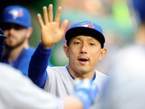Blue Jays’ Munenori Kawasaki celebrated his 34th birthday with some help from teammates on Wednesday. (AFP/PHOTO)