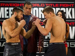 Chris Horodecki, right, shown here with his opponent Lance Palmer and World Series of Fighting owner Ray Sefo during Thursday's weigh in, will fight Palmer for the featherweight title Friday at the Edmonton Expo Centre. (Lucas Noonan, WSOF)