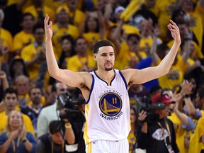 Golden State Warriors' Klay Thompson celebrates during his team's win over the Cleveland Cavaliers in Game 1 of the NBA Finals. (USA Today Sports)