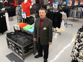 Giant Tiger store owner Leo Suglio shows off an expanded men's fashion section at the new London Road location on Friday June 5, 2015 in Sarnia, Ont. More than $1 million has gone into building Sarnia's second Giant Tiger store set to be opened to the public Saturday. (Observer staff/Postmedia Network)