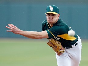 The Oakland A's called up switch-pitcher Pat Venditte from the minors. (USA Today photo)