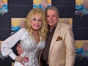 Country music legends Mickey Gilley and Dolly Parton.