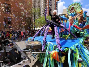 Bubbles fly by a float during the Pride Parade in downtown Edmonton, Alta., on Saturday, June 7, 2014.  Perry Mah/Edmonton Sun