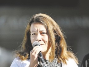 Chris Boudreau, shown speaking at an anti-ISIS rally in Calgary last fall, is trying to reach kids at risk of radicalization with her Mothers for Life group. (Postmedia Network file photo)