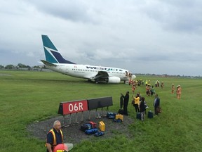 A WestJet plane skidded off the runway at Montreal's Trudeau airport on Friday.
(Twitter photo via @RocknMom)