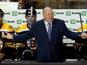 Boston Bruins coach Claude Julien reacts to a call during NHL play against the St. Louis Blues at TD Banknorth Garden. (Greg M. Cooper/USA TODAY Sports)