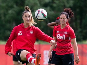 Carmelina Moscato, right, shown here at practice with teammate Selenia Iacchelli, says the team feels ready going into their first game of the Women's World Cup. (David Bloom, Edmonton Sun)
