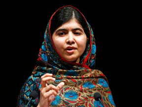 Pakistani schoolgirl Malala Yousafzai speaks at Birmingham library in Birmingham, England, Oct. 10, 2014. (DARREN STAPLES/Reuters)