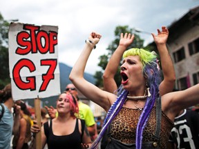 Anti-G7 protestors take part in a demonstration in Garmisch-Partenkirchen, Germany, June 6, 2015. (CHRISTIAN HARTMANN/Reuters)