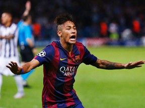 Barcelona’s Neymar celebrates after scoring during the Champions League final against Juventus Saturday at the Olympic Stadium in Berlin. (Reuters/Michael Dalder)