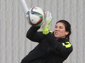 Team USA women's soccer goalie Hope Solo catches the ball during practice for the FIFA Women's World Cup  in Winnipeg, Man. Wednesday June 03, 2015.Brian Donogh/Winnipeg Sun/Postmedia Network