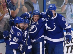 Tampa Bay Lightning center Tyler Johnson (second from left) celebrates with teammates after scoring a goal against the Chicago Blackhawks in the second period in game two of the 2015 Stanley Cup Final at Amalie Arena. (Reinhold Matay/USA TODAY Sports)