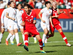 Canada's Christine Sinclair celebrates after scoring on China during FIFA Women''s World Cup at Commonwealth Stadium in Edmonton, Alberta on Saturday June 6, 2015. (Ian kucerak/Postmedia Network)