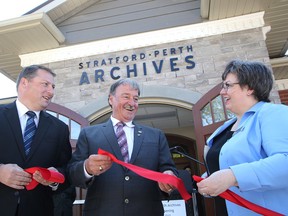 Stratford Mayor Dan Mathieson, Perth County Warden Bob Wilhelm and archivist Betty Jo Belton share a laugh after the ribbon-cutting ceremony Saturday at the grand opening of the new Stratford-Perth Archives. MIKE BEITZ/The Beacon Herald