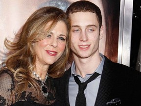 Rita Wilson and son Chester Hanks are seen in this Dec. 15, 2011 file photo.       REUTERS/Carlo Allegr