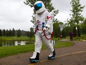 Hal Friesen sports a space suit during the Gutsy Walk for Crohn's and Colitis at Rundle Park in Edmonton, Alta., on Sunday, June 9, 2013. Codie McLachlan/Edmonton Sun/Postmedia Network