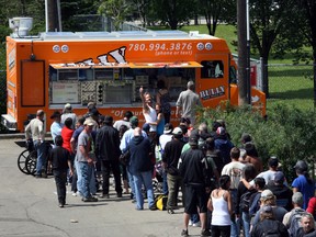 The Bully Food truck severed lunch to people at the Bissel Centre in Edmonton, Alberta on Saturday, July 13, 2013.  Bully had made enough food to serve 400 people.  Perry Mah/Edmonton Sun