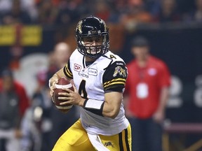 VANCOUVER, BC - NOVEMBER 30: Zach Collaros #4 of the Hamilton Tiger-Cats rushes upfield during the 102nd Grey Cup Championship Game against the Calgary Stampedersc at BC Place November 30, 2014 in Vancouver, British Columbia, Canada. Calgary won 20-16.   Jeff Vinnick/Getty Images/AFP== FOR NEWSPAPERS, INTERNET, TELCOS & TELEVISION USE ONLY ==