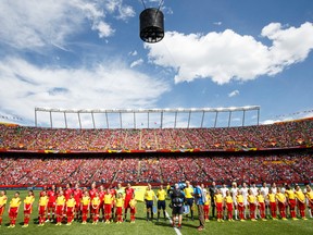 Team Canada (left) and Team China are seen during the opening ceremonies of a FIFA Women's World Cup 2015 match between Canada and China at Commonwealth Stadium in Edmonton, Alta., on Saturday June 6, 2015. (Ian Kucerak/Edmonton Sun/Postmedia Network)