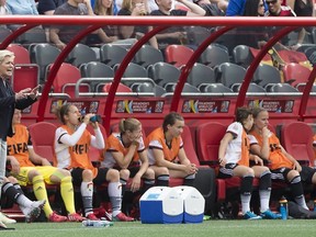 Germany's coach Silvia Neid gives instructions to her players during a Group B match against Ivory Coast at the 2015 FIFA Women's World Cup at Landsdowne Stadium in Ottawa on June 7, 2015. (AFP PHOTO/NICHOLAS KAMM)