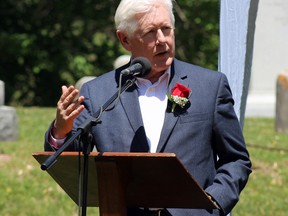 Former Canadian politician Bob Rae giving an address at the 124th anniversary of Sir John A. Macdonald's death at Cataraqui Cemetery in Kingston on Saturday. (Steph Crosier/The Whig-Standard)