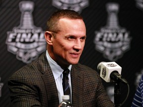 Tampa Bay Lightning general manager Steve Yzerman talks with media during media day the day before the 2015 Stanley Cup Final at Amalie Arena. Kim Klement-USA TODAY Sports