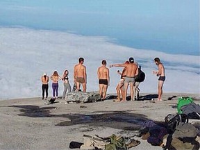 Tourists allegedly stripped for photos at Mt. Kinabalu in Malaysia in an act an official there believes triggered a deadly earthquake and landslides. (Kinabalu Park Facebook Photo)