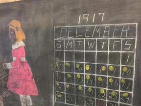 A post by OKC Public Schools to Twitter identifies this image as a nearly 100-year-old chalkboard drawing that depicts a countdown to Christmas in 1917. OKC Public Schools/Twitter