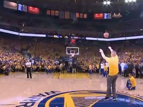 Jason from San Jose sinks a half-court shot to win a BMW during Game 2 of the NBA Finals in Oakland.