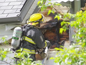 All workers, including firefighters, will now be eligible for post-traumatic stress disorder coverage. (KEN SPICER FILE PHOTO/FOR THE WINNIPEG SUN)