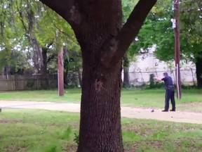 North Charleston police officer Michael Slager, right, is seen allegedly shooting 50-year-old Walter Scott in the back as he runs away, in this still image from video in North Charleston, South Carolina taken April 4, 2015. A grand jury on June 8, 2015 indicted Slager, a white former police officer accused of shooting a black man in the back. REUTERS/Feidin Santana/handout via Reuters