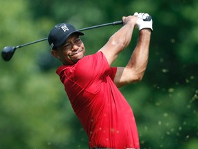 Tiger Woods tees off at the first hole during the final round of the Memorial Tournament at Muirfield Village Golf Club. (Brian Spurlock-USA TODAY Sports)