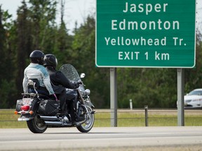 Motorcyclists ride on Anthony Henday Drive northbound near the Yellowhead Highway exit in Edmonton, Alta., on Sunday June 7, 2015. A female rider died in a crash in the area on June 6. Ian Kucerak/Edmonton Sun