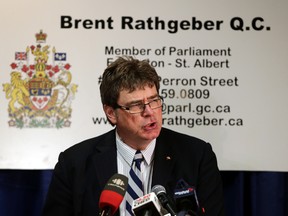 MP Brent Rathgeber introduces Dave Wynn's Law during a news conference in St. Albert , Alberta on Monday June 8, 2015. The law in honour of RCMP officer Dave Wynn seeks to tighten rules for bail release. Perry Mah/Edmonton Sun
