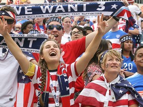 USA fans cheer for their team in  a game against Australia during FIFA Women’s World Cup play in Winnipeg, Man. Monday June 08, 2015.
Brian Donogh/Winnipeg Sun/Postmedia Network