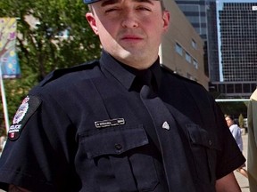 Const. Dan Woodall, seen here in this 2011 file photo, has been confirmed by police sources to be the officer shot and killed while trying to serve a warrant in west Edmonton on Monday, June 8, 2015. Edmonton Sun file