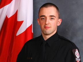 Edmonton police Const. Daniel Woodall, 35, was killed and another officer was wounded when a man opened fire on them Tuesday night. (Edmonton Police Service)