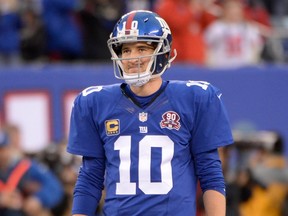 New York Giants quarterback Eli Manning reacts after a touchdown was called back on a holding penalty during the game against the Philadelphia Eagles at MetLife Stadium on Dec. 28, 2014. (Robert Deutsch/USA TODAY Sports)
