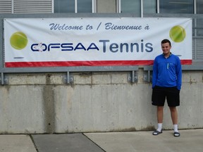 St. Charles College's Brad MacKenzie poses in front of the OFSAA tennis banner in Toronto last week. MacKenzie was named this week's Cambrian College/Sudbury Star GameChanger award winner after competing at three OFSAA championships last week.