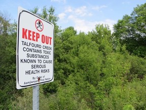 The Aamjiwnaang First Nations won’t be taking this sign down anytime soon, even though the Ministry of the Environment reports that Talfourd Creek is safe for recreational use.PHOTO TAKEN MONDAY, JUNE 8, 2015. (CHRIS O’GORMAN/ SARNIA OBSERVER/ POSTMEDIA NETWORK)